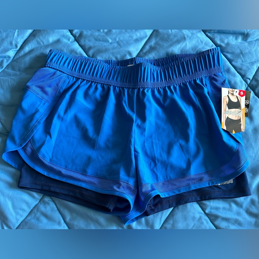 NWT Avia lined running shorts. Small 4-6 body binding polyester and spandex